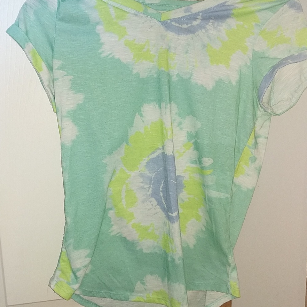 A blie green shirt